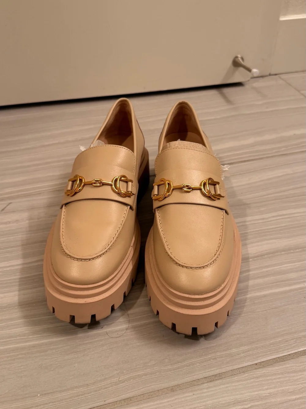 Stuart Weitzman Women's Platform Loafers in Beige with Gold Buckle